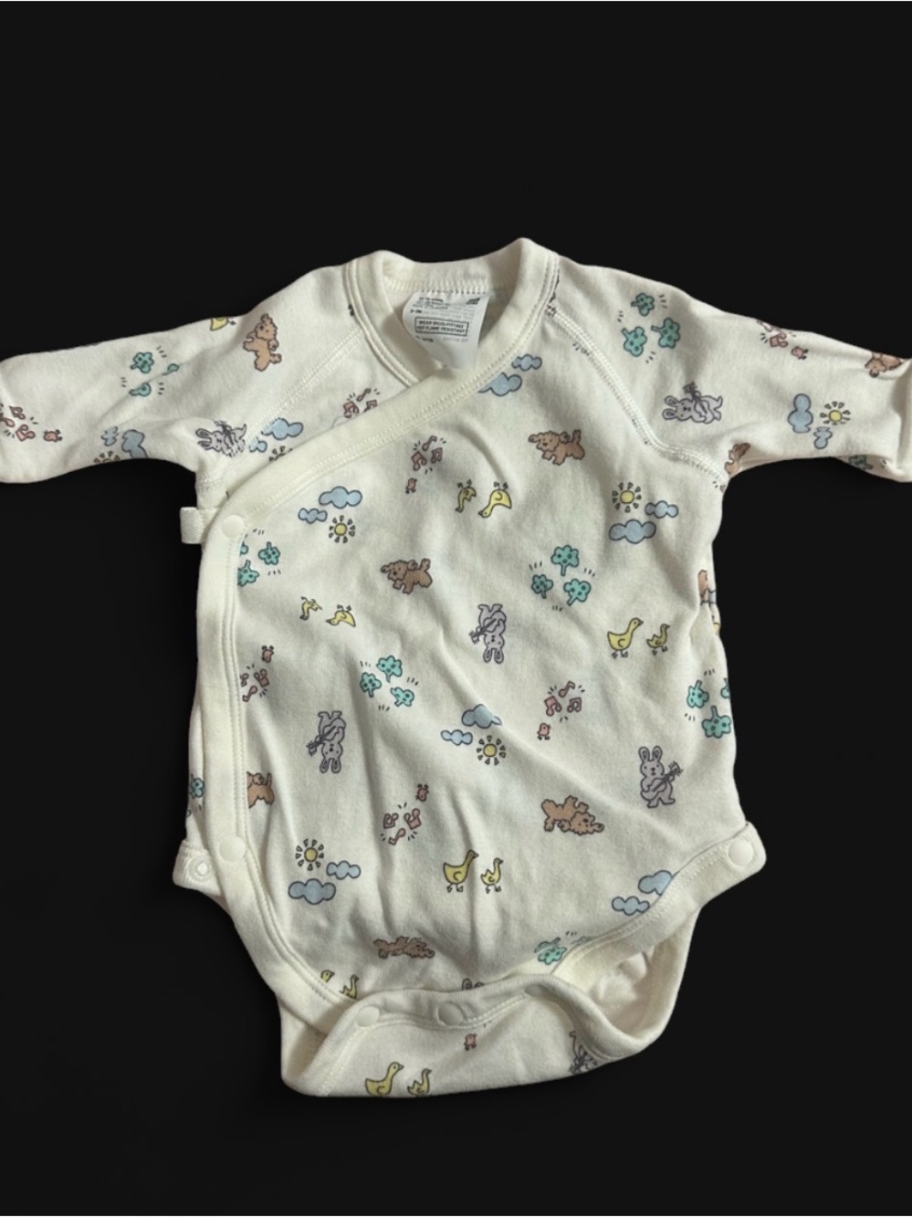 Uniqlo Cream Wrap One-Piece Bodysuit with Pastel Animal Print